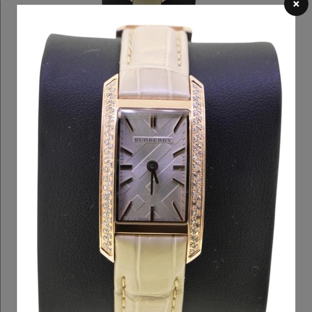 Burberry rose gold & diamond leather strap watch.